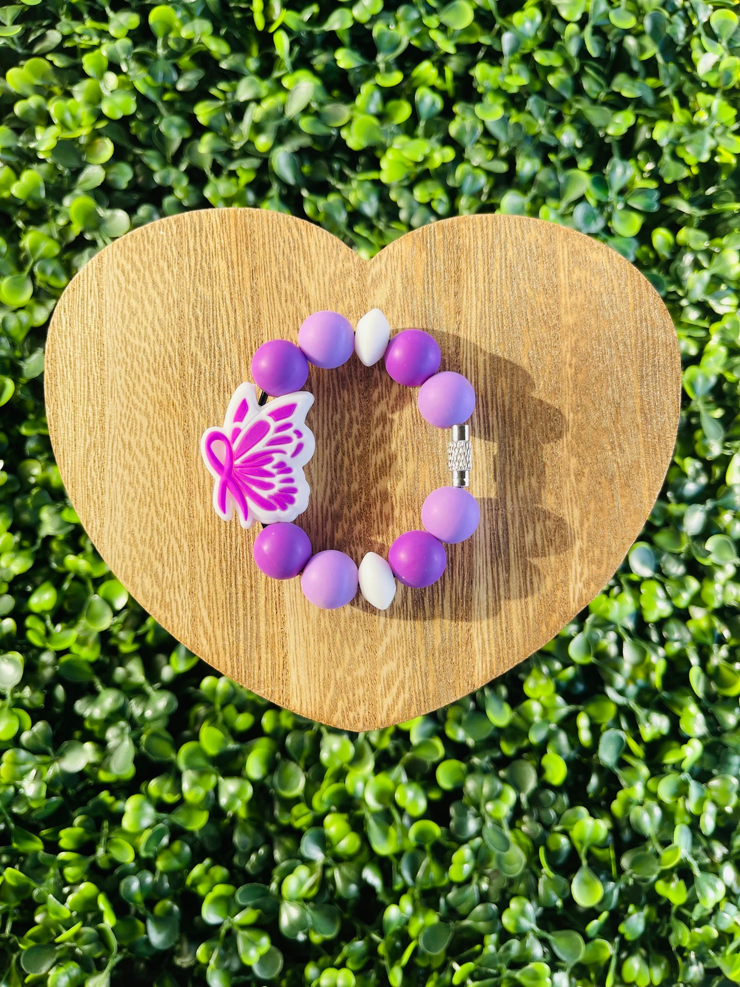 Purple ribbon handle charm