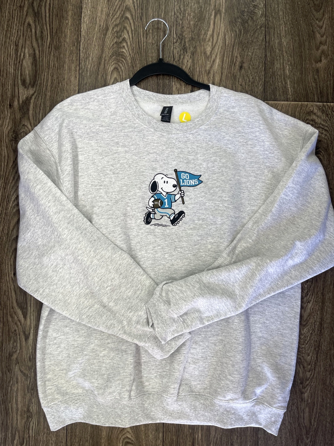 Gray embroidered football fan dog sweatshirt