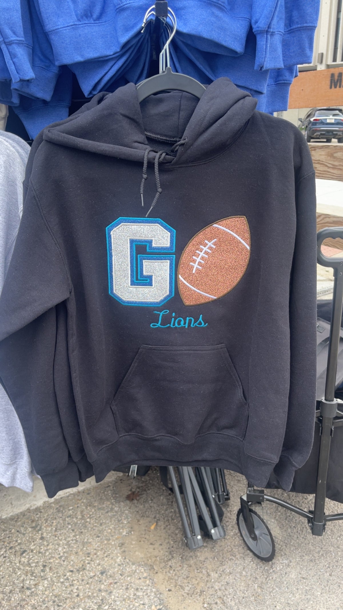 Black Go Lions embroidered hoodie with glitter football design
