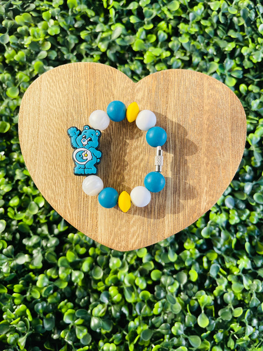 Blue care bear handle charm