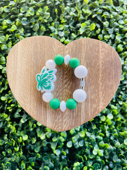 Green ribbon handle charm