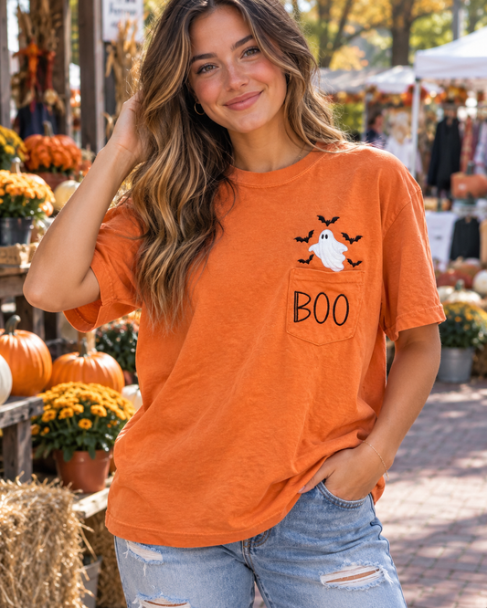Model wearing orange Boo Pocket Ghost embroidered tee