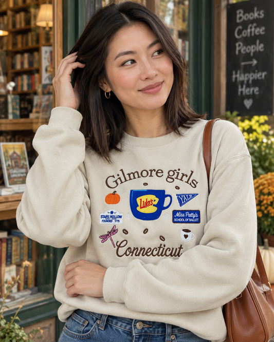 Model wearing Connecticut Coffee embroidered sweatshirt
