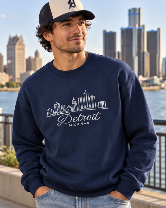 Model wearing navy Detroit Skyline embroidered sweatshirt