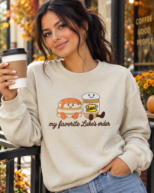 Model wearing Favorite Diner Order embroidered sweatshirt