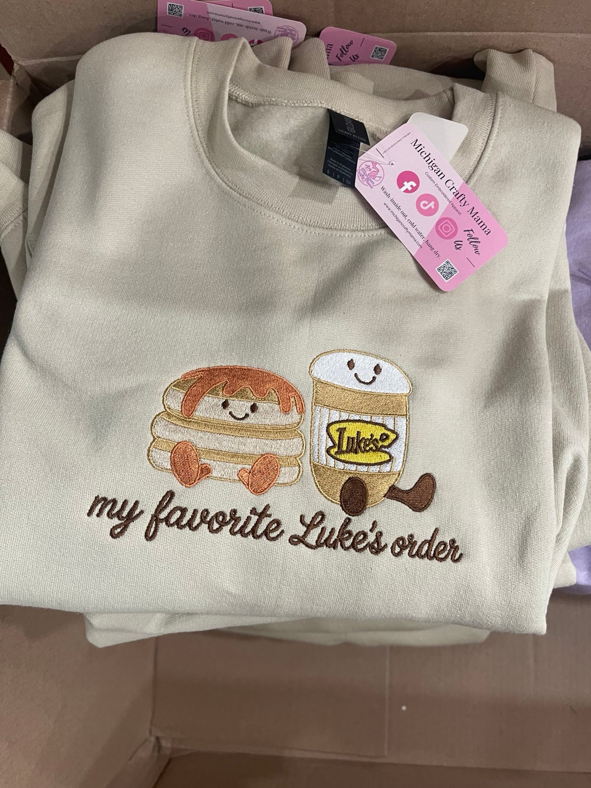 Sand embroidered diner order sweatshirt