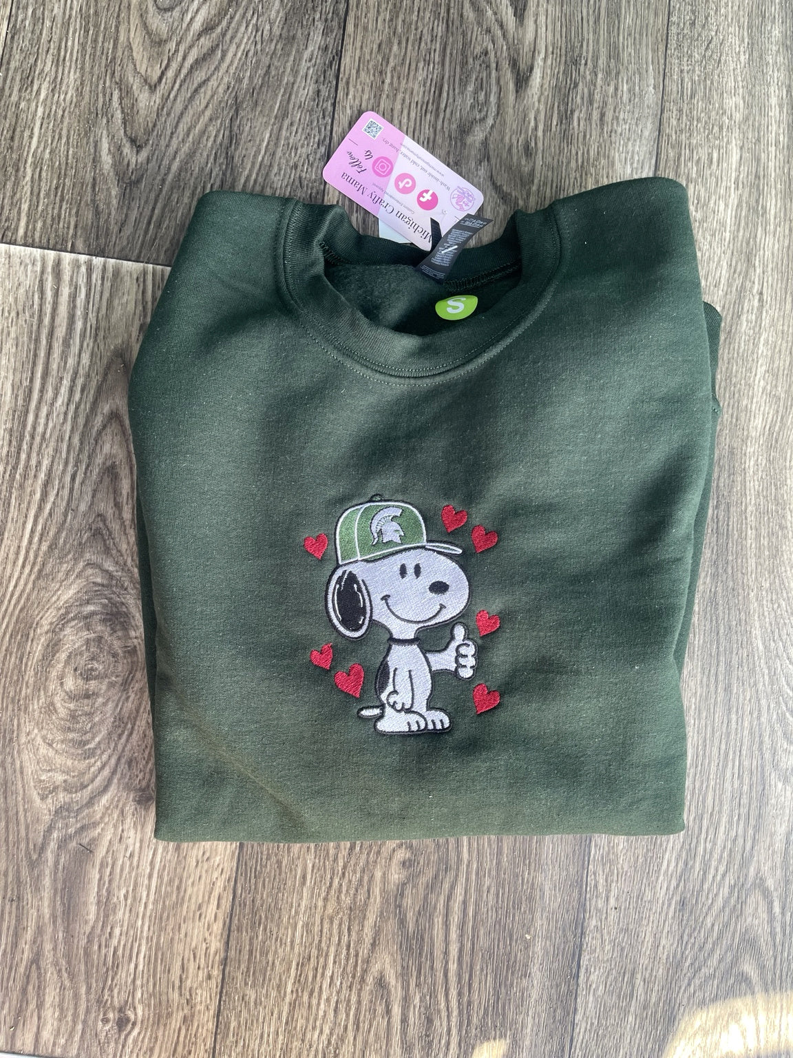 Forest green embroidered dog sweatshirt with green cap