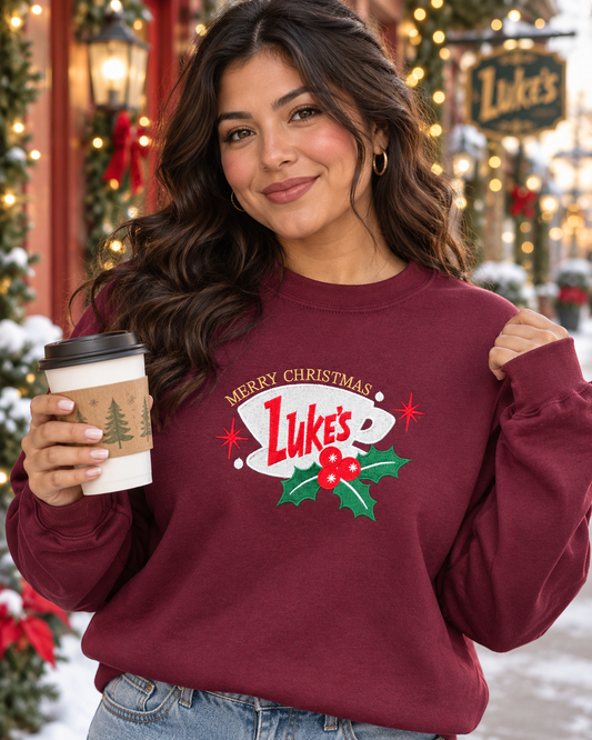 Model wearing Holiday Coffee embroidered sweatshirt