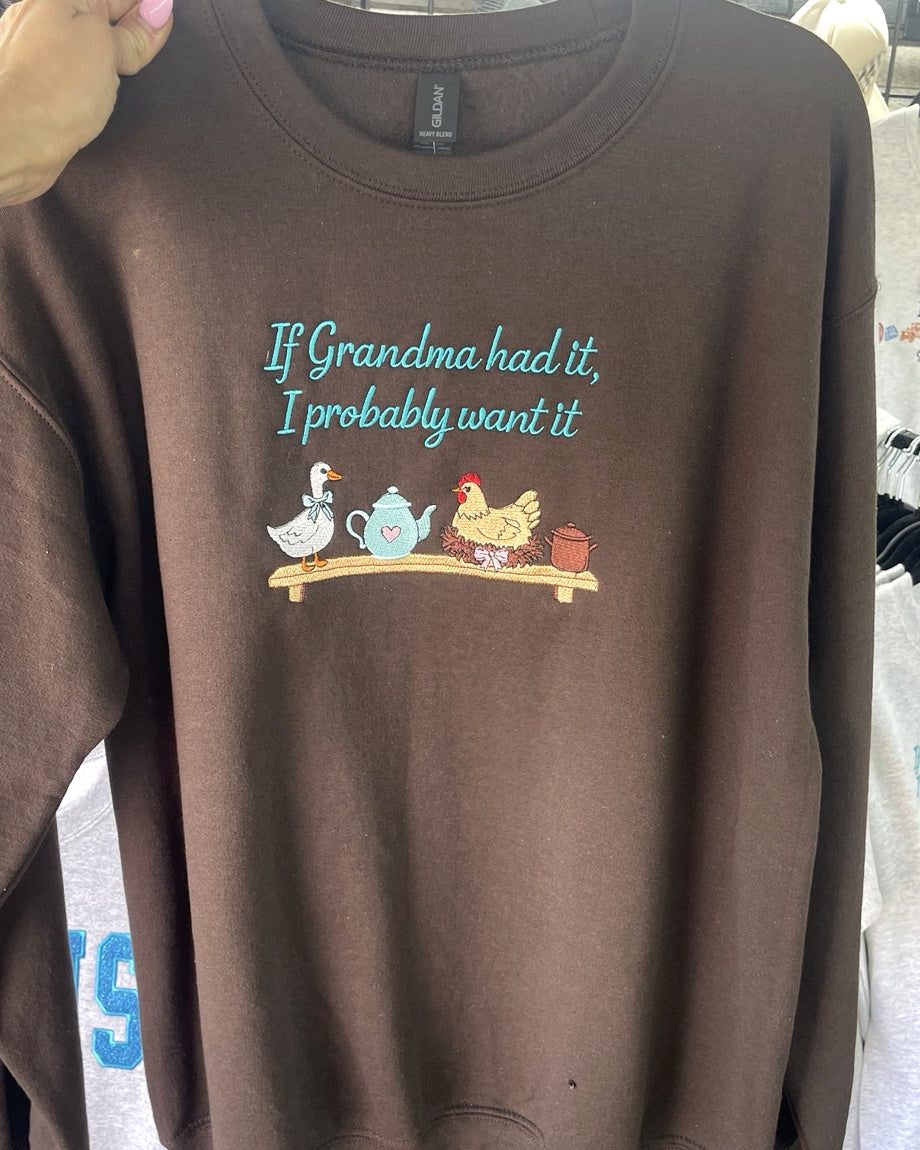 Brown embroidered crewneck sweatshirt reading If Grandma had it, I probably want it