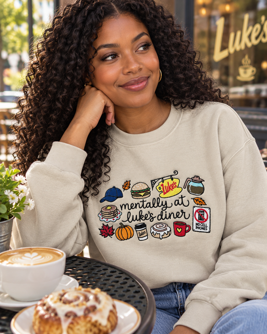 Model wearing Mentally at the Diner embroidered sweatshirt